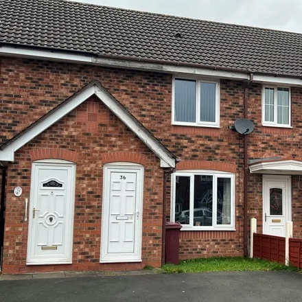Rent this 2 bed townhouse on Lindisfarne Avenue in Blackburn, BB2 3ER