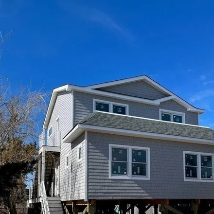 Rent this 4 bed house on 332 Dehnhoff Walk in Village of Ocean Beach, Islip