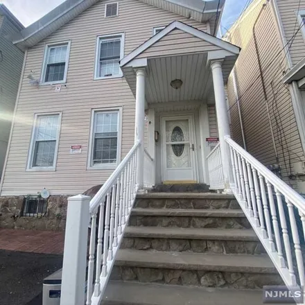 Buy this 4 bed house on 7 Garfield Avenue in Paterson, NJ 07522