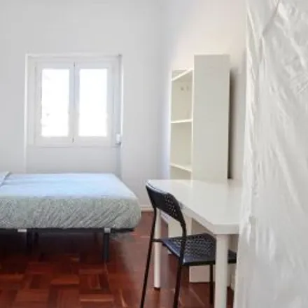 Rent this 4 bed room on Capital in Avenida Elias Garcia 87, 1050-097 Lisbon