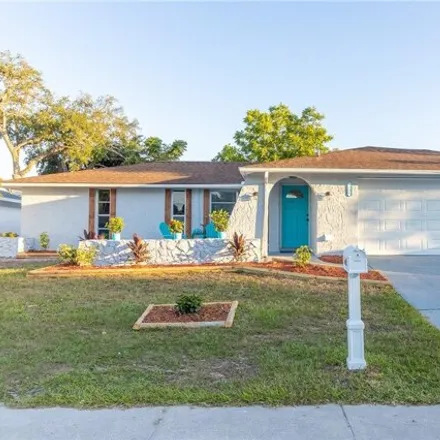 Buy this 3 bed house on 7278 Stone Road in Jasmine Estates, FL 34668