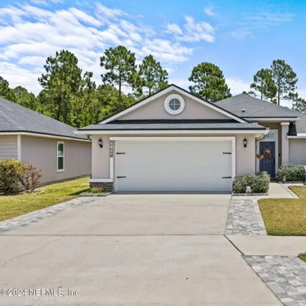 Buy this 4 bed house on 97648 Albatross Dr in Yulee, Florida