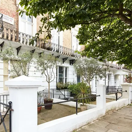 Rent this 2 bed townhouse on 49 Westbourne Gardens in London, W2 5NS