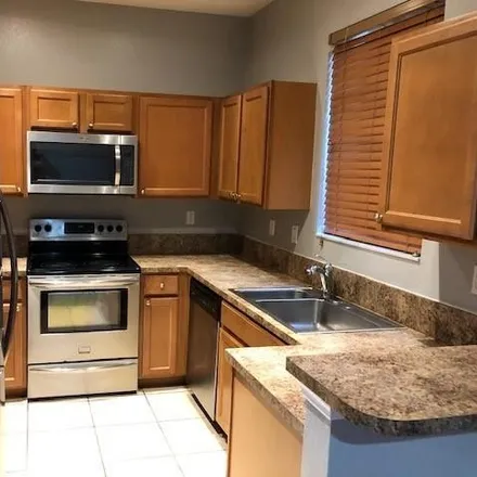 Rent this 4 bed townhouse on 21407 Northwest 13th Court in Miami Gardens, FL 33169
