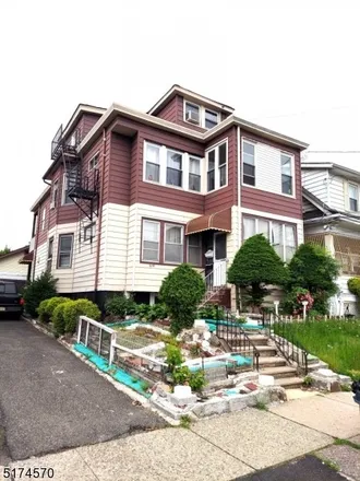 Buy this 7 bed townhouse on 506 20th Avenue in Paterson, NJ 07513