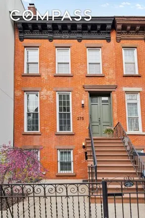 Buy this 6 bed townhouse on 275 14th Street in New York, NY 11215