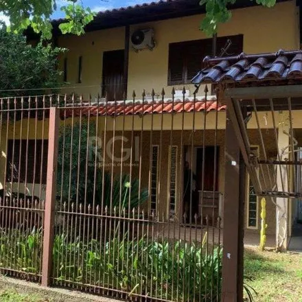 Buy this 3 bed house on Rua Dário Totta in Nonoai, Porto Alegre - RS