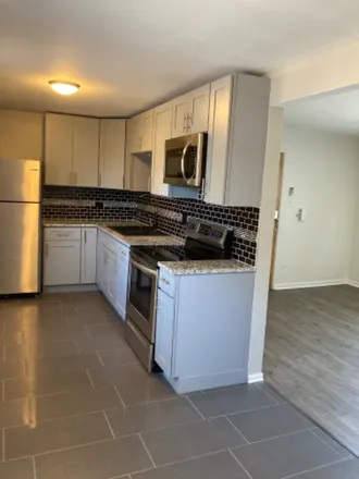 Rent this 2 bed condo on 80th S Exchange Ave