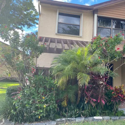 Rent this 3 bed townhouse on 3966 Cocoplum Circle in Coconut Creek, FL 33063