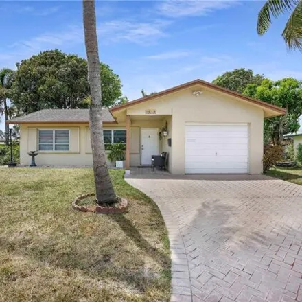Buy this 3 bed house on 7641 Northwest 71st Avenue in Tamarac, FL 33321