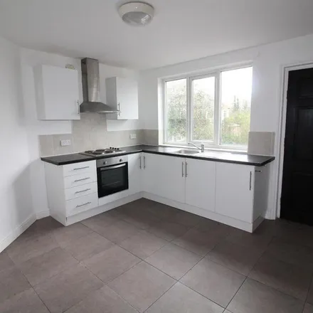 Rent this 3 bed townhouse on Thornton Avenue in Leeds, LS12 3JD