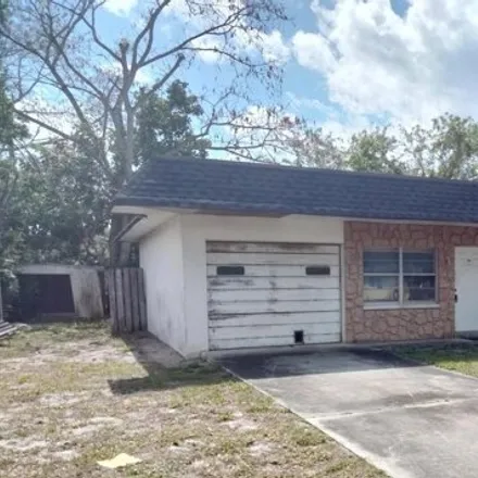 Buy this 3 bed house on 1680 Southeast Arapaho Avenue in Stuart, FL 34994