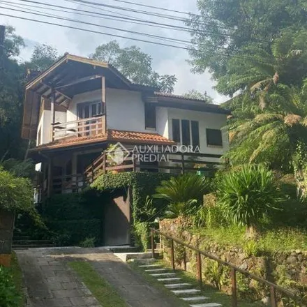 Rent this 3 bed house on Rua Roberto Eduardo Xavier in Vila do Bosque, Gramado - RS