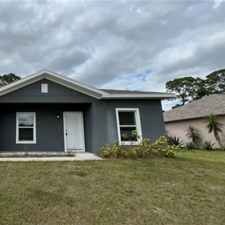 Image 1 - 983 Pyracantha Street Northwest, Palm Bay, FL 32907, USA - House for rent