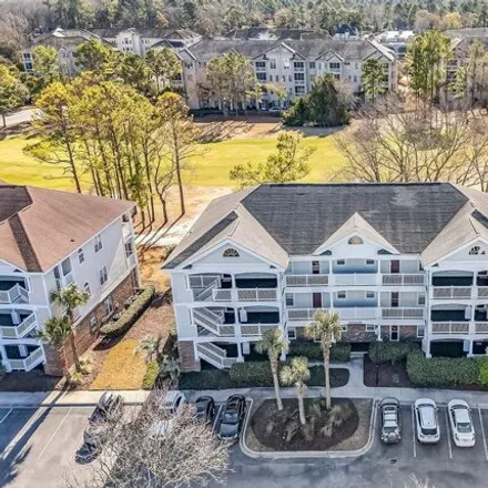Buy this 2 bed condo on Arbor Cove in Barefoot Resort, North Myrtle Beach