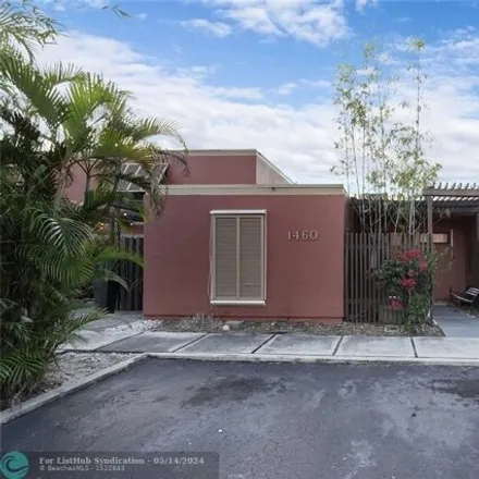 Buy this 3 bed house on 1460 Fairway Rd in Pembroke Pines, Florida