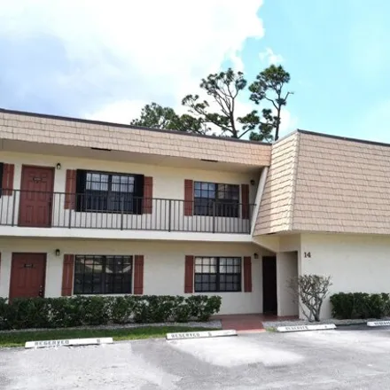 Rent this 2 bed condo on 4354 Cypress Court in Greenacres, FL 33463