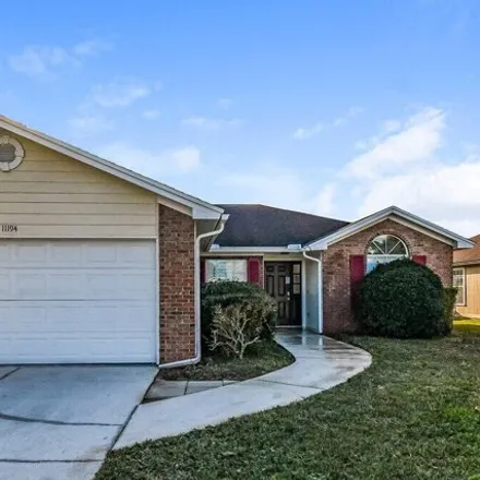 Rent this 3 bed house on 11194 Wandering Oaks Dr in Jacksonville, Florida