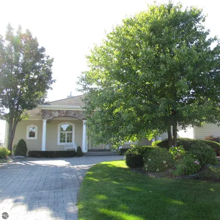 Buy this 3 bed house on 5138 Arrowhead Circle in Acme Township, MI 49690