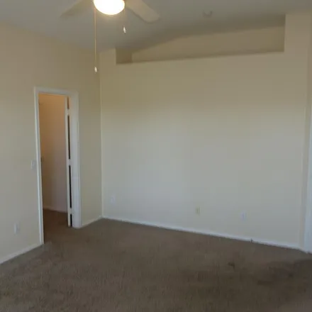 Rent this 3 bed apartment on 8812 East Rainier Drive in Pinal County, AZ 85118