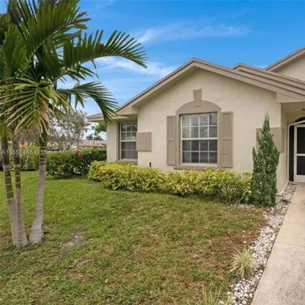 Rent this 3 bed house on 9482 Boca Gardens Parkway in Palm Beach County, FL 33496