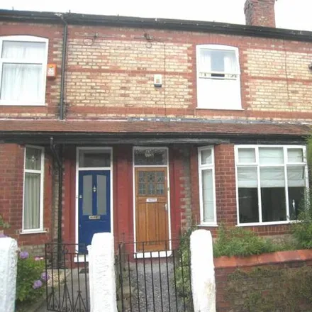 Rent this 3 bed townhouse on Disley Avenue in Manchester, M20 1JU