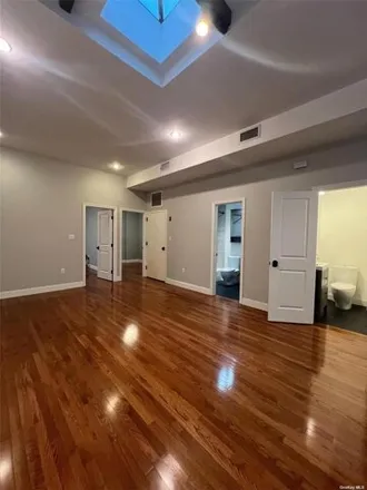 Rent this 4 bed house on 61-56 Gates Avenue in New York, NY 11385