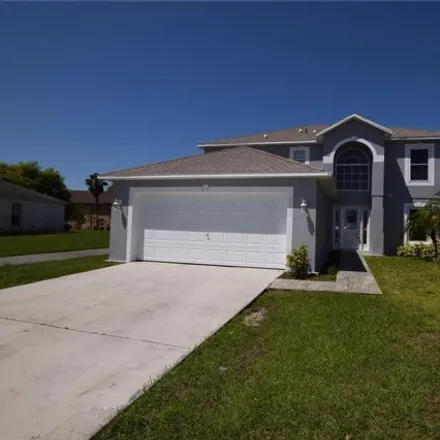Rent this 4 bed house on 2120 Marisol Loop in Kissimmee, FL 34743