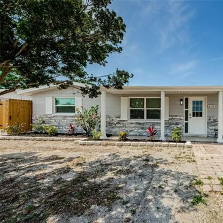 Buy this 4 bed house on 4744 Guardian Ave in Holiday, Florida