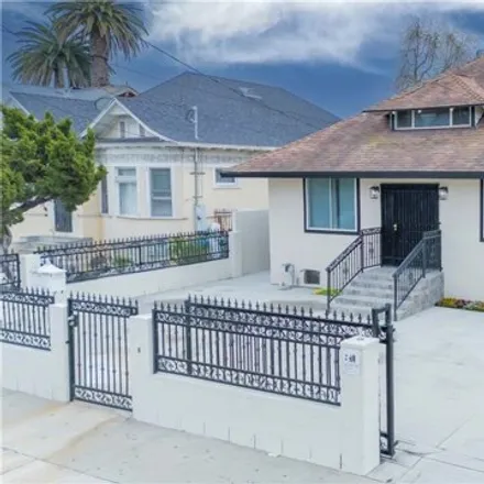 Buy this 7 bed house on 252 West 40th Place in Los Angeles, CA 90037