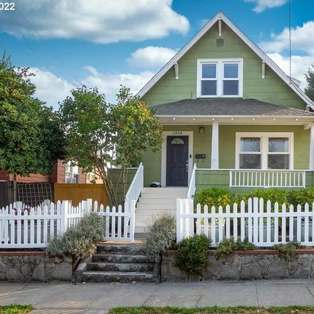 Buy this 4 bed house on 6848 Northeast Garfield Avenue in Portland, OR 97211