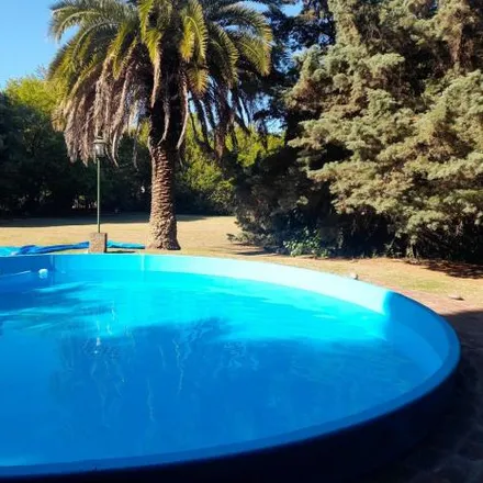 Buy this 4 bed house on Ruta Provincial 6 Gobernador Antonio Francisco Cafiero in Partido de General Rodríguez, Buenos Aires