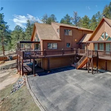 Buy this 4 bed house on 497 Woodside Dr in Pine, Colorado