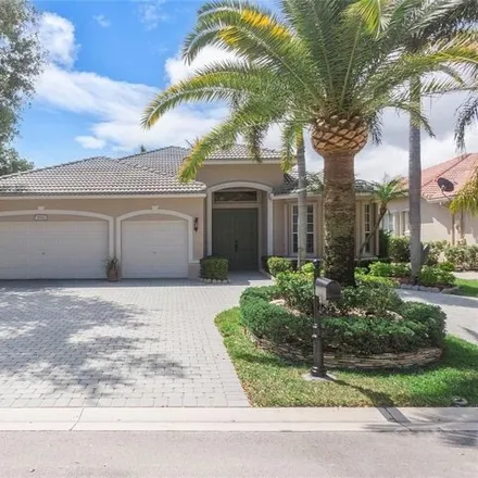 Buy this 4 bed house on 5950 Northwest 56th Drive in Coral Springs, FL 33067