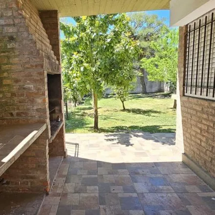 Buy this 3 bed house on Calle 255 in Partido de Berazategui, 1884 Sourigues