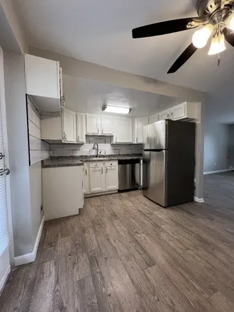 Rent this 2 bed condo on 10760 W 8th Avenue