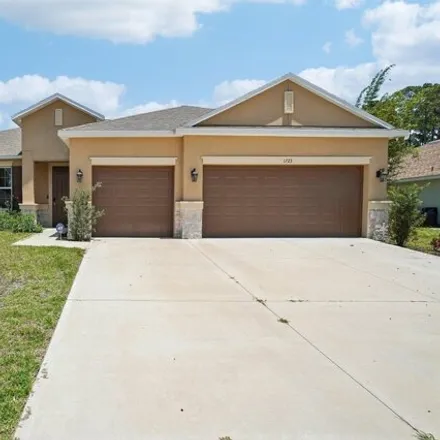 Buy this 4 bed house on 1723 Sayabec Street Northwest in Palm Bay, FL 32907