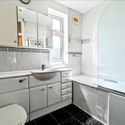 Rent this 4 bed townhouse on 21 Mount Road in London, SW19 8ET