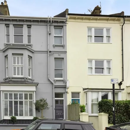 Rent this 4 bed townhouse on Warleigh Road in Brighton, BN1 4NT