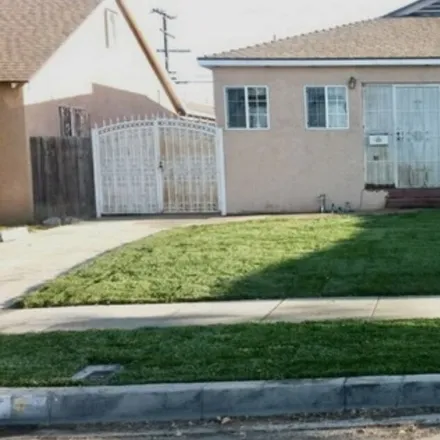 Buy this 4 bed house on 630 West 112th Street in Los Angeles, CA 90044