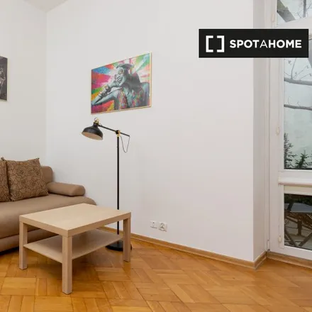 Rent this studio apartment on Aleja Na Skarpie 19 in 00-488 Warsaw, Poland