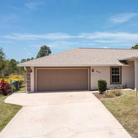 Buy this 4 bed house on 3016 Southeast Wake Road in Port Saint Lucie, FL 34984