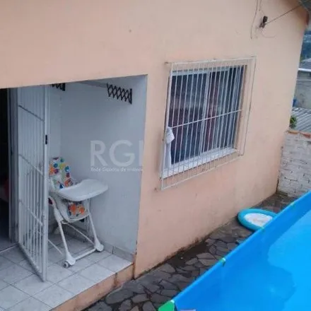 Buy this 2 bed house on Beco 149 in Vila São José, Porto Alegre - RS