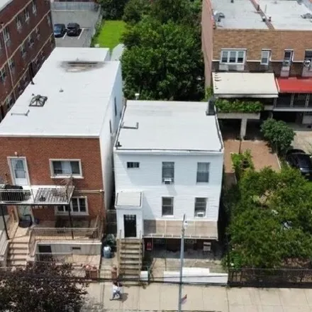 Buy this 3 bed house on 25-12 Crescent Street in New York, NY 11102