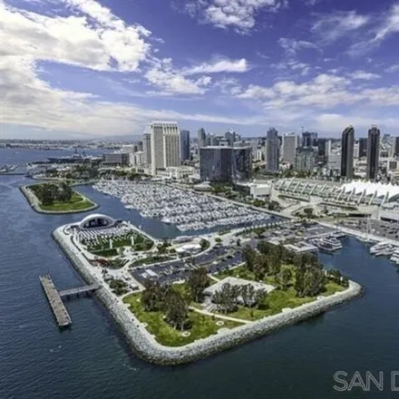 Rent this 2 bed condo on Harbor Club in Martin Luther King Jr. Promenade, San Diego