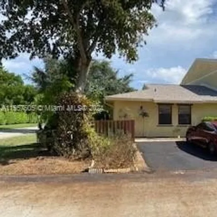 Rent this 2 bed house on Country Lake Circle in Palm Beach County, FL 33484