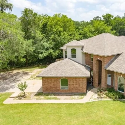 Buy this 4 bed house on 10137 County Road 400 in Lake Jackson, TX 77422