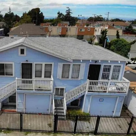 Buy this 6 bed house on 9415;9417;9419 Peach Street in Oakland, CA 94621