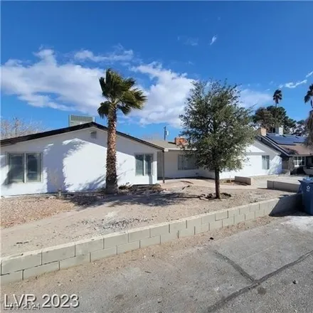 Buy this 4 bed house on 1704 North Shadow Mountain Place in Las Vegas, NV 89108