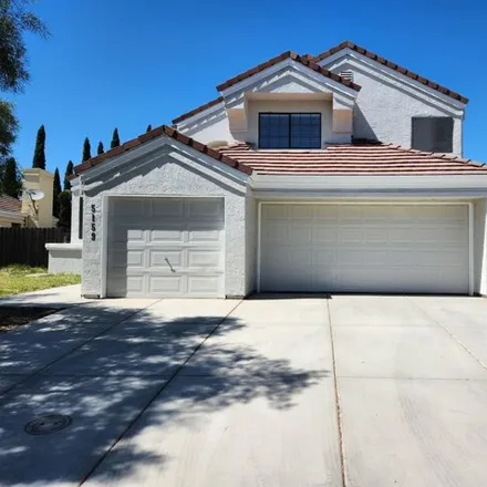 Buy this 4 bed house on 5183 Laguna Park Drive in Elk Grove, CA 95758